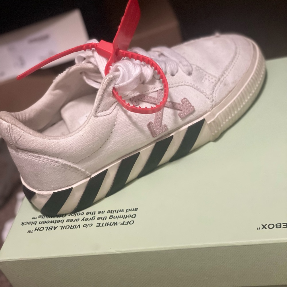 Off white sneakers need to be cleaned, stains are removable